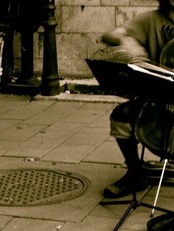 busking street cellist in Montreal