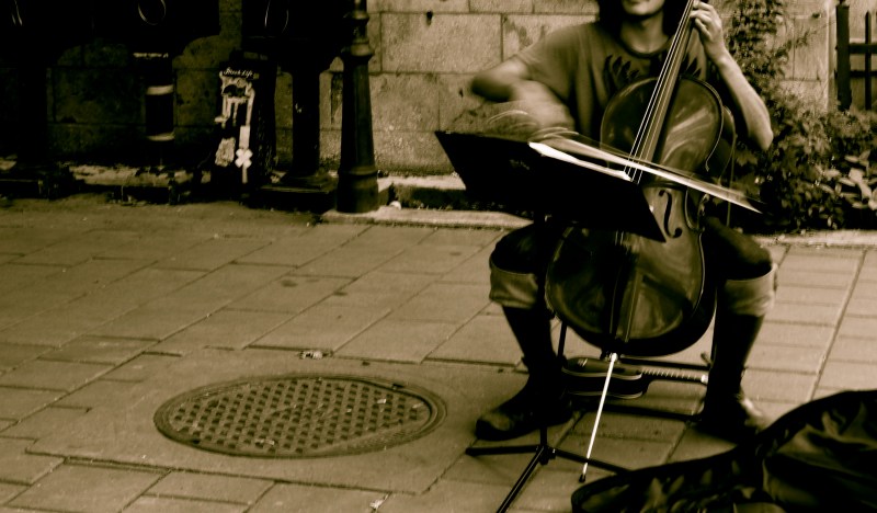 busking street cellist in Montreal