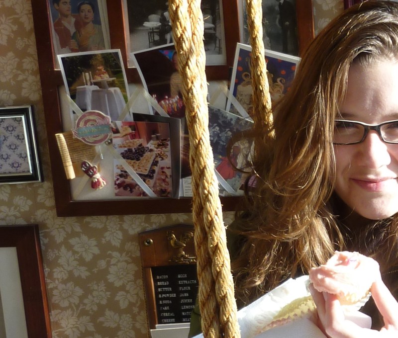 Girl enjoying cupcakes at Coco Locale
