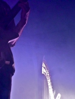 Close up on Barr Brothers' guitar and harp