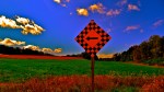 country road sign, distorted colours