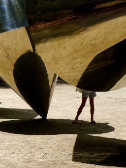 Child plays around art sculptures, Australian National Gallery