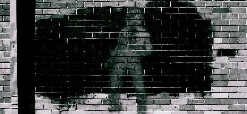 Australian graffiti black and white man silhouetted Canberra