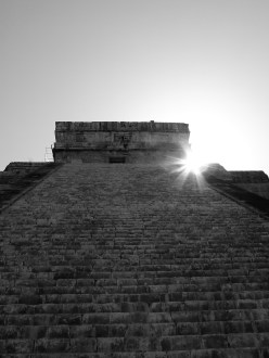 Sun rising behind Temple of Kukulkan/El Castillo in Chichen Itza, Mexico 2012