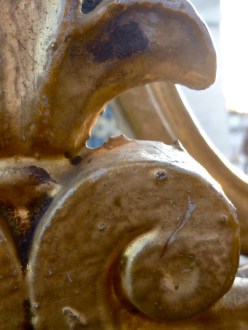 Gold fleur-de-lis gates at the jardin tuileries, Place de la concorde, Paris, sun flare